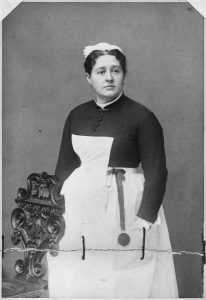 lossy-page1-411px-Unidentified_woman_in_maid's_uniform._Date_on_photo,_1884._-_NARA_-_297702.tif